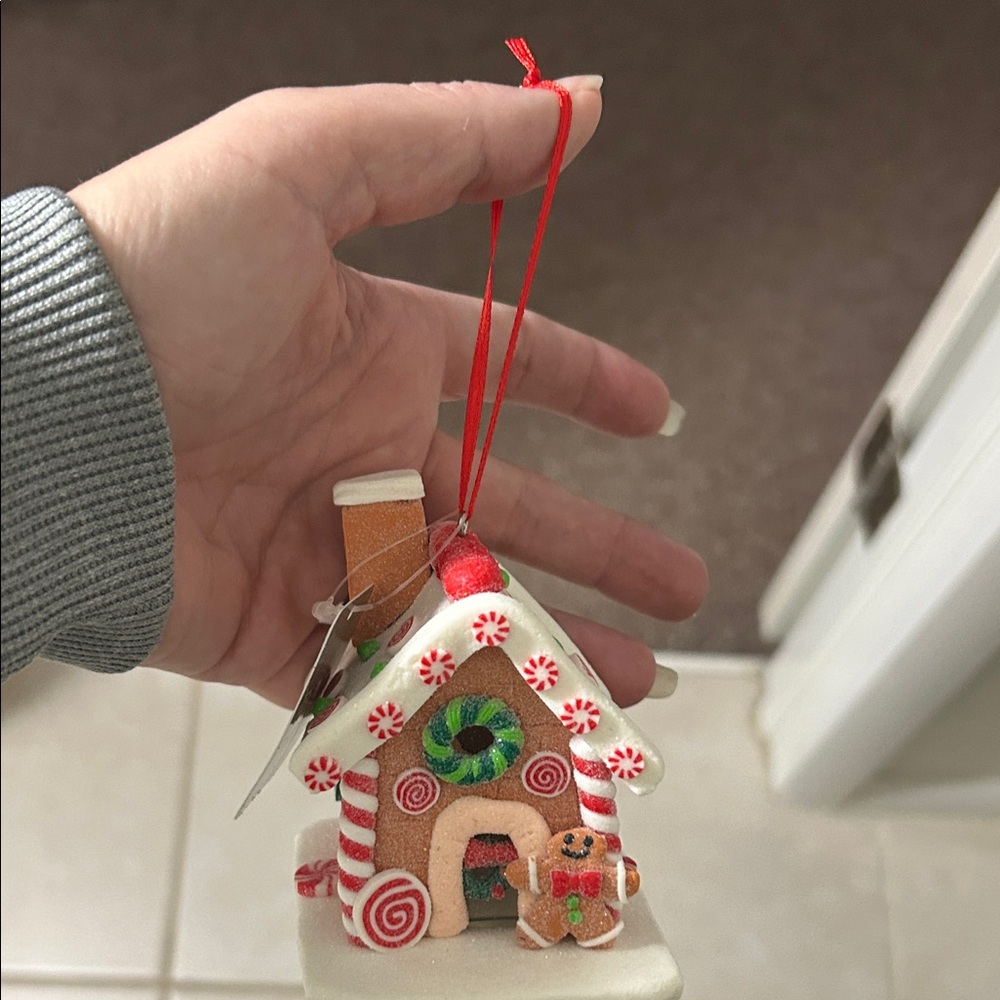 Festive Gingerbread House Ornament with Red and Green Accents
